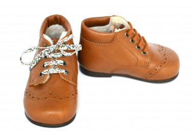 Chaussures chaudes pour l'hiver pour bébés doublées laine naturelle