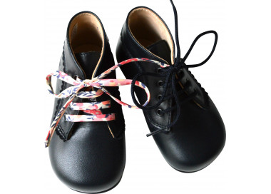 Bottillon bébés en cuir avec frisettes bleu marine