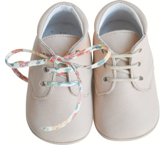 Chaussons souples pour bébés en cuir beige rosé