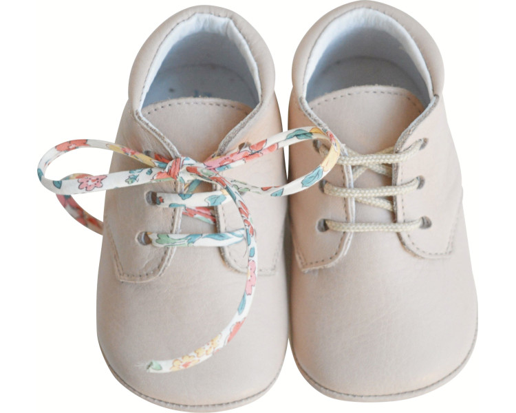 Chaussons souples pour bébés en cuir beige rosé