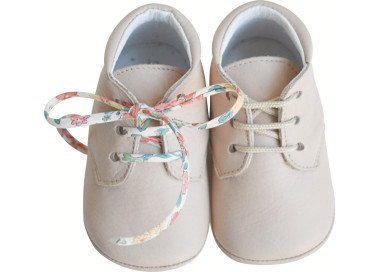 Chaussons souples pour bébés en cuir beige rosé